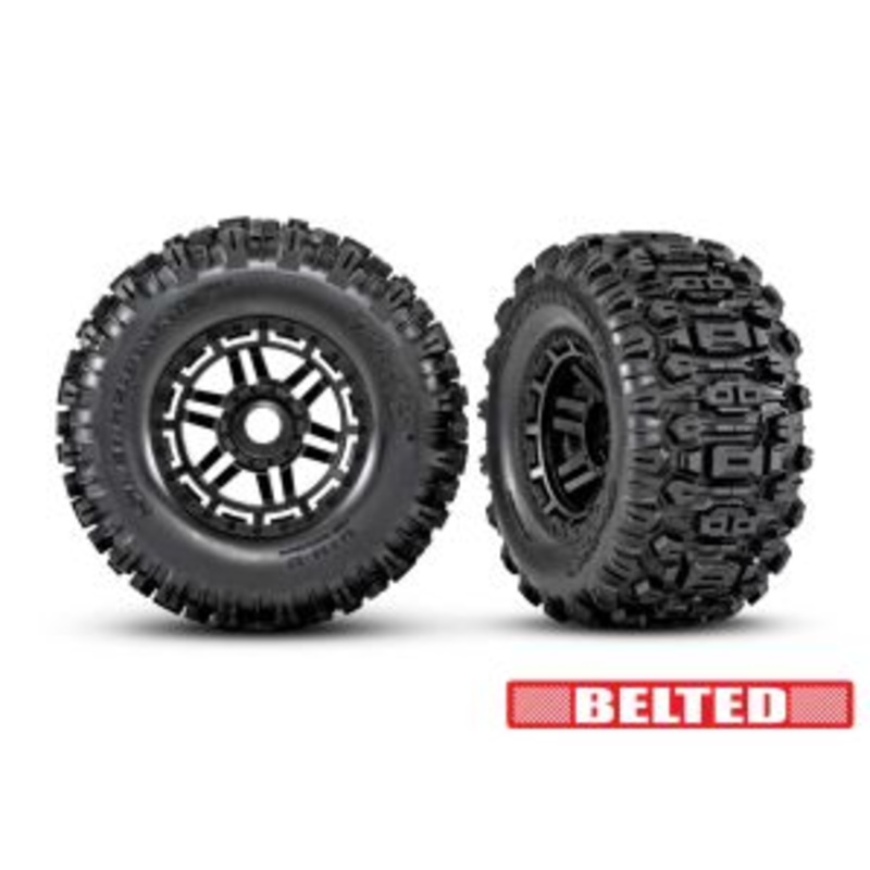 TRAXXAS 8979 Tires & wheels, assembled, glued (black wheels, belted Sledgehammer All-Terrain tires, dual profile (2.9" outer, 3.8" inner), foam inserts) (2) (17mm splined) (TSM rated)